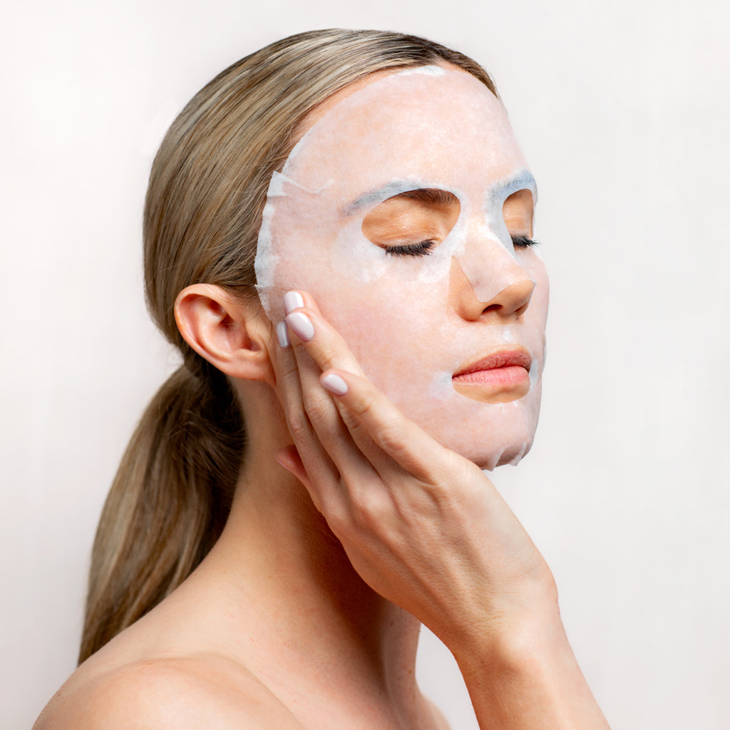 Model applying Collagen Gel Cloth Masque to her face | Adashiko Collagen | 100% Natural Skincare