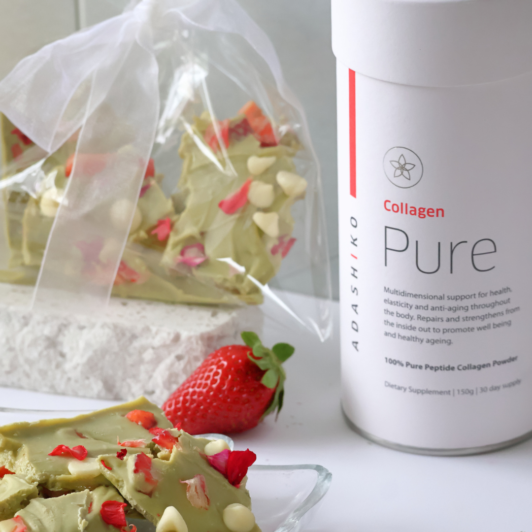 White Chocolate + Matcha Christmas Collagen Bark next to a tub of Pure Collagen Powder | Adashiko Collagen | 100% Natural Skincare