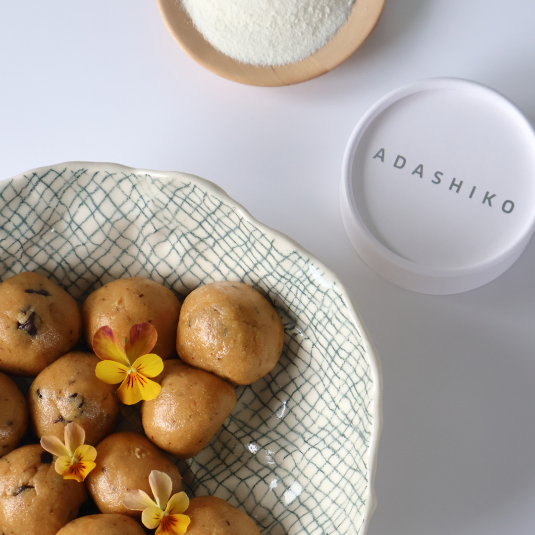 Ellen Larsen Collagen Cookie Dough Bites on a plate next t a tub of Adashiko Collagen | 100% Natural Skincare