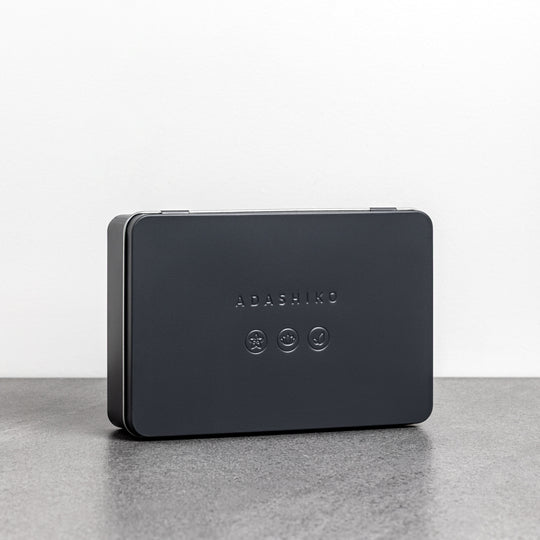 Adashiko Collagen Skincare Discovery Kit - closed tin sitting on bench top - Adashiko Collagen | 100% Natural Skincare