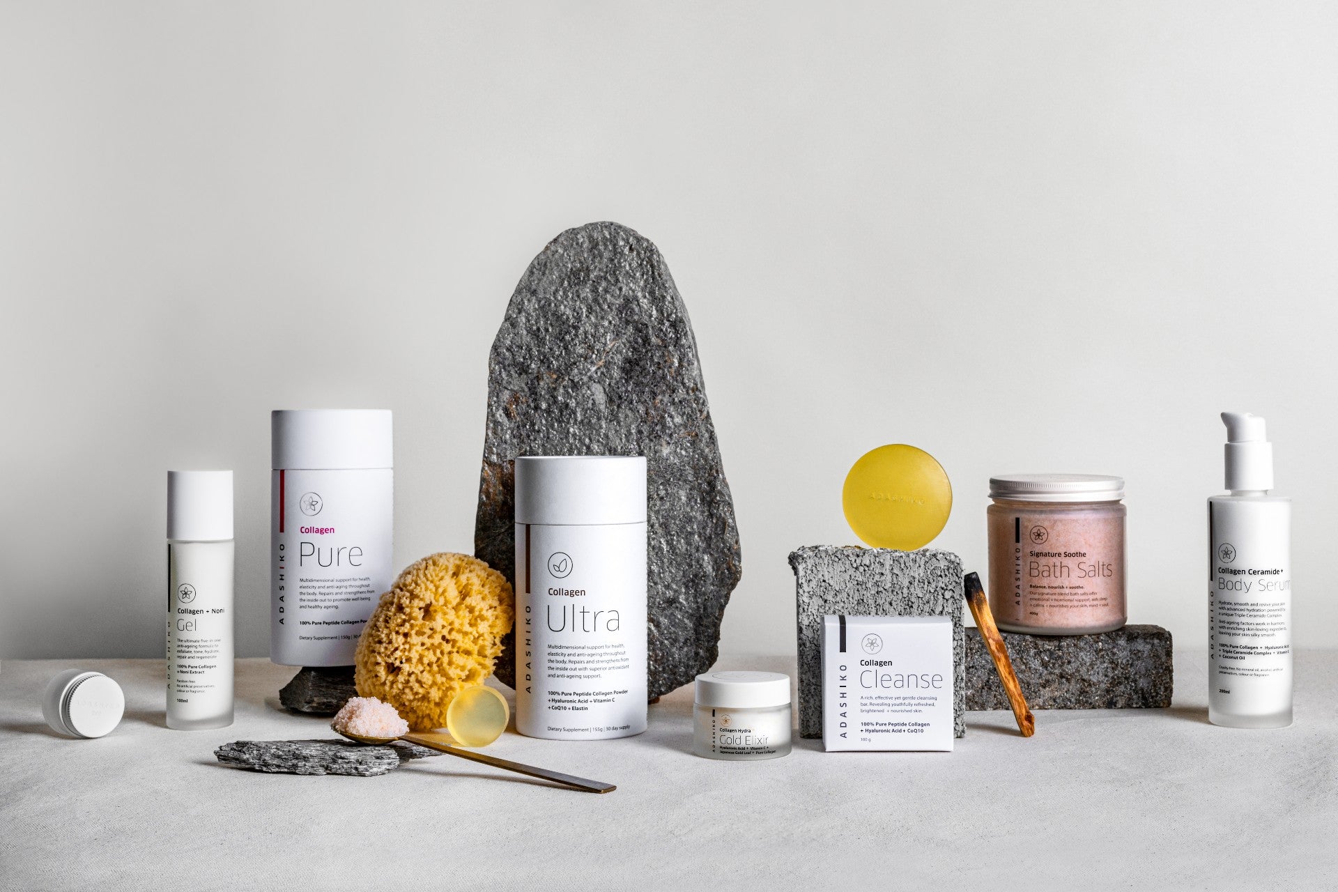 Display of Adashiko Products with a grey background | Adashiko Collagen | 100% Natural Skincare