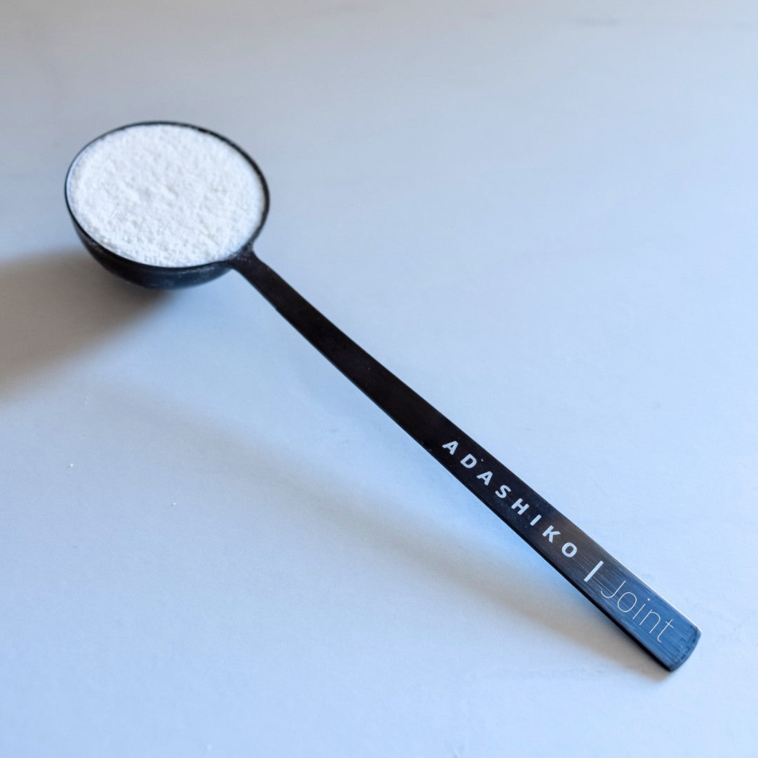 Scoop filled with Joint Collagen Powder | Adashiko Collagen | 100% Natural Skincare