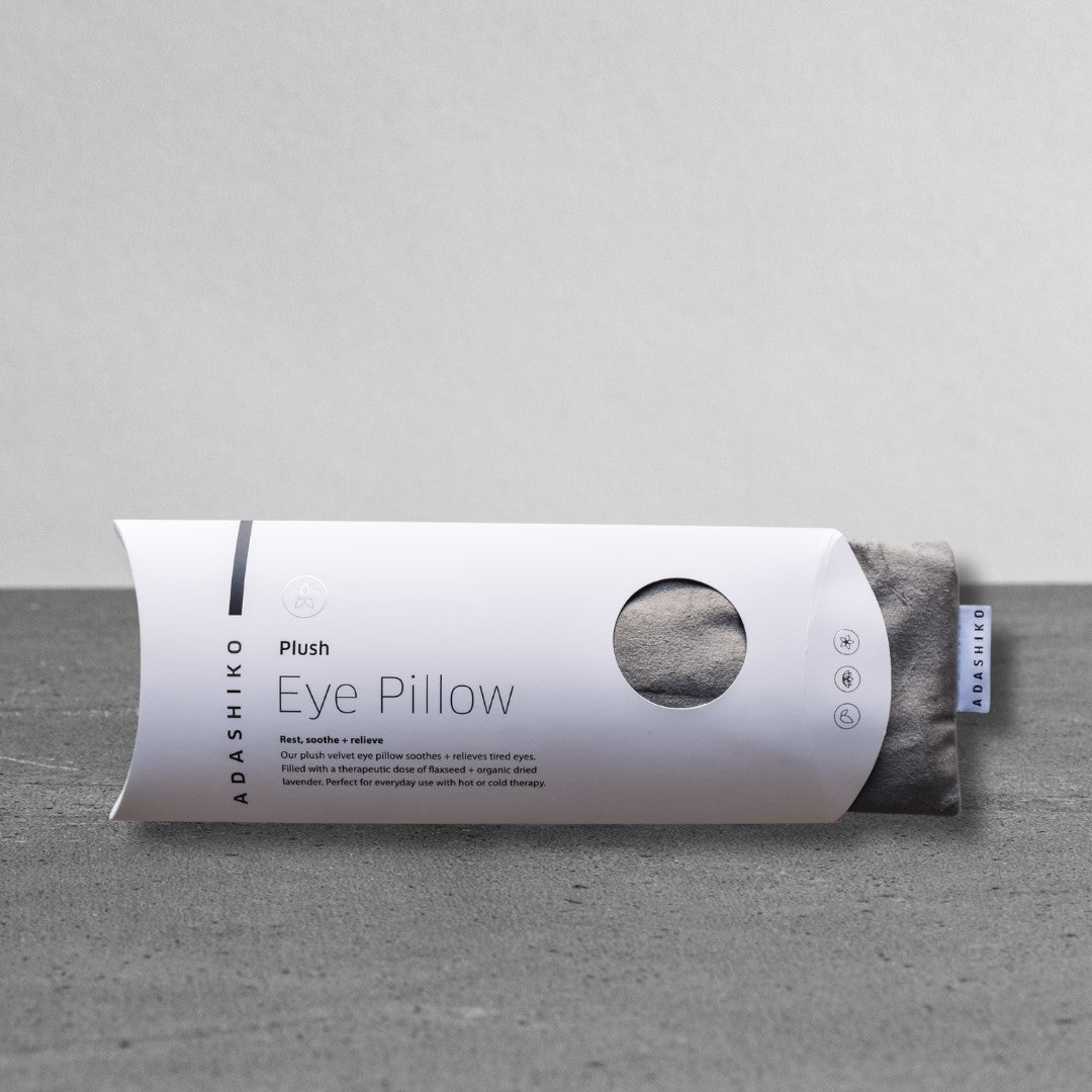 Plush Eye Pillow with labeled end poking out of its box | Adashiko Collagen | 100% Natural Skincare