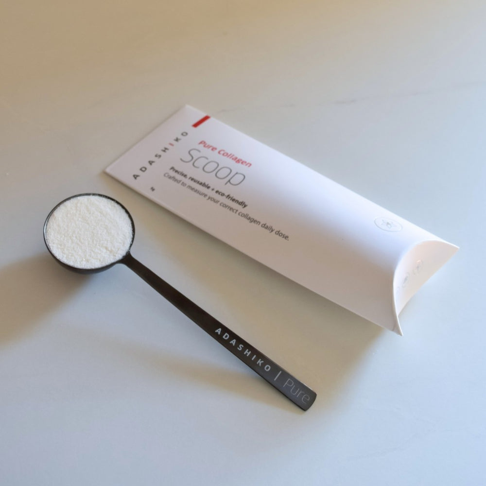Scoop filled with Pure Collagen Powder | Adashiko Collagen | 100% Natural Skincare
