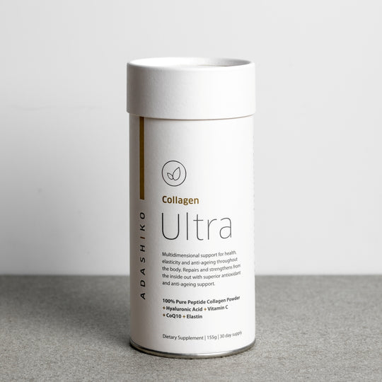 Tub of Ultra Collagen Powder against a grey background | Adashiko Collagen | 100% Natural Skincare