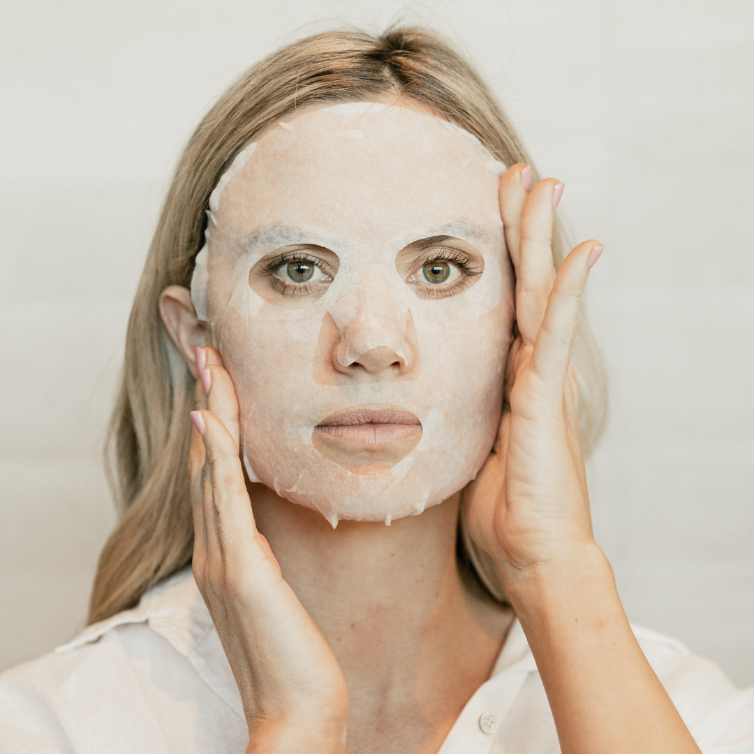 Model applying a Collagen Gel Cloth Masque to her face | Adashiko Collagen | 100% Natural Skincare