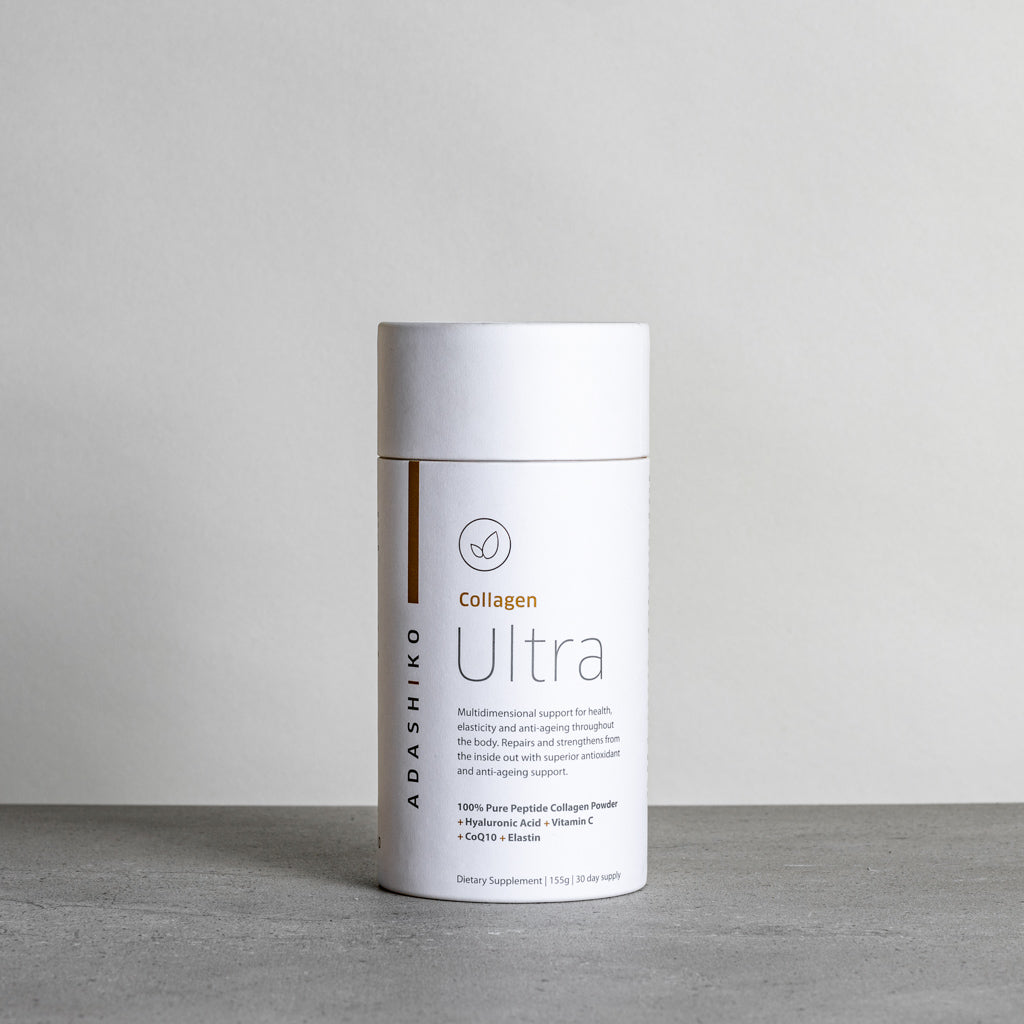 Tub of Ultra Collagen Powder against a grey background | Adashiko Collagen | 100% Natural Skincare