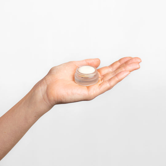 Collagen Balm - 5ml jar, open, held in a model's hand | Adashiko Collagen | 100% Natural Skincare