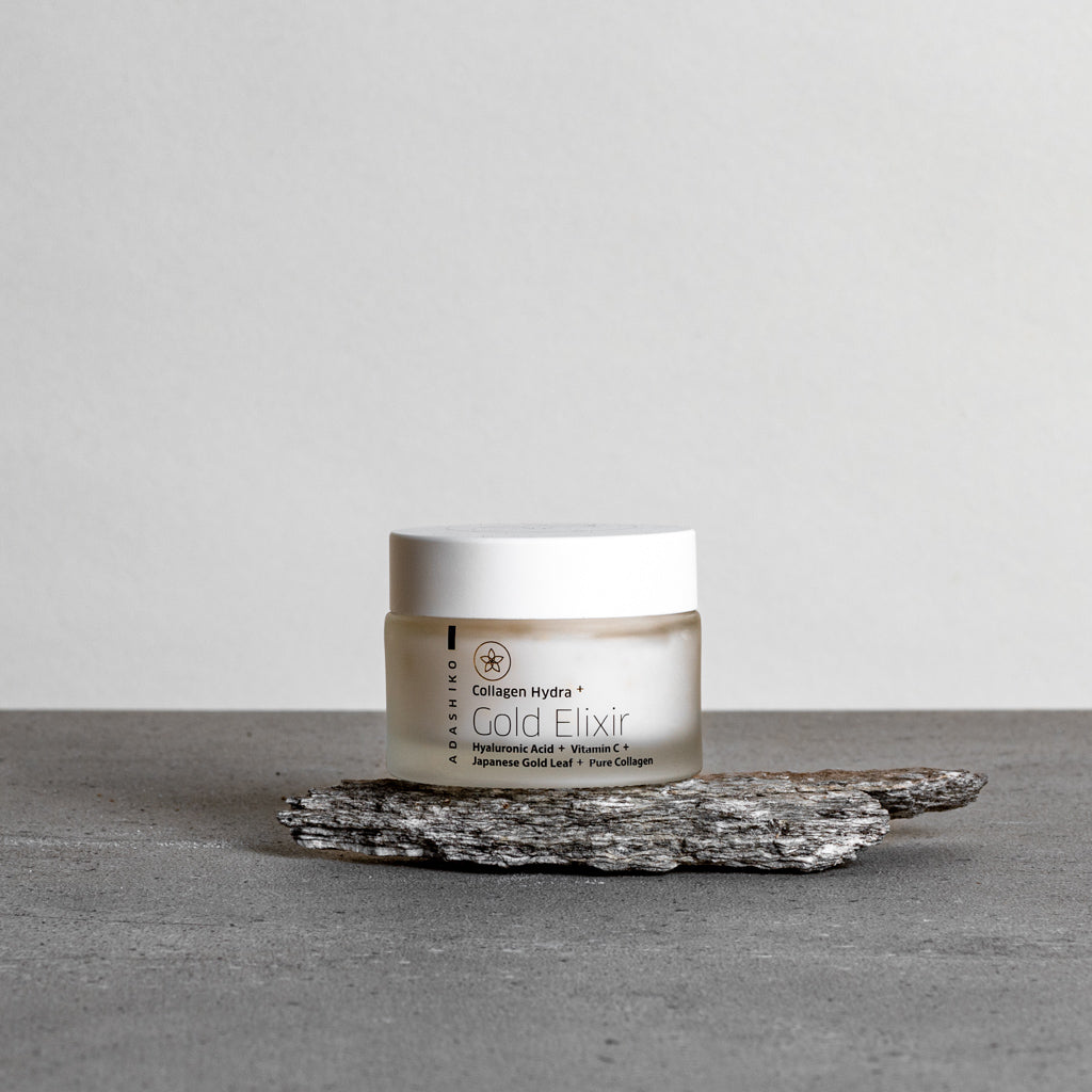 Collagen Hydra+ Gold Elixir - jar shown against a grey background | Adashiko Collagen | 100% Natural Skincare