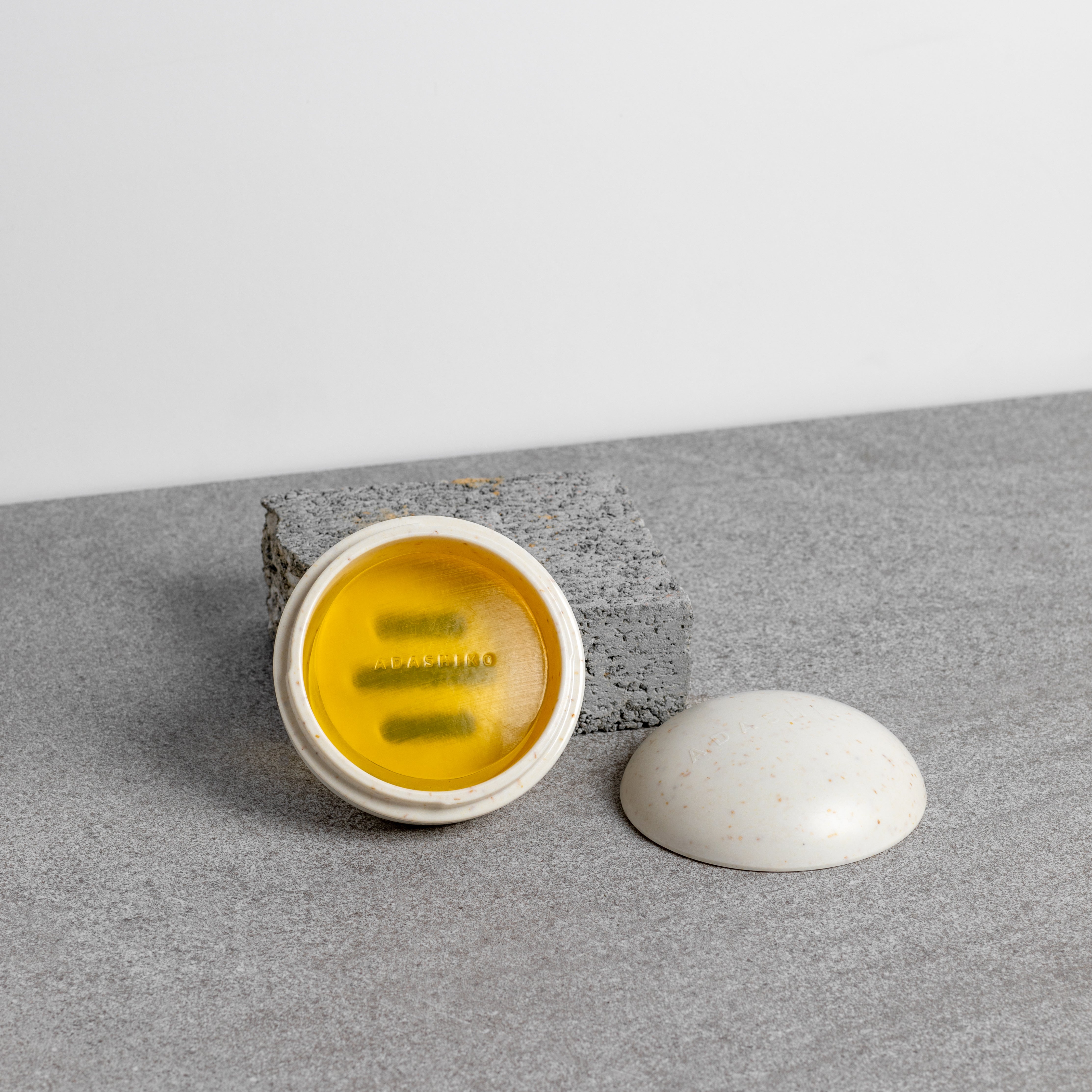 Collagen Cleanse Storage Case - Oat, open with Cleanse Bar inside | Adashiko Collagen | 100% Natural Skincare
