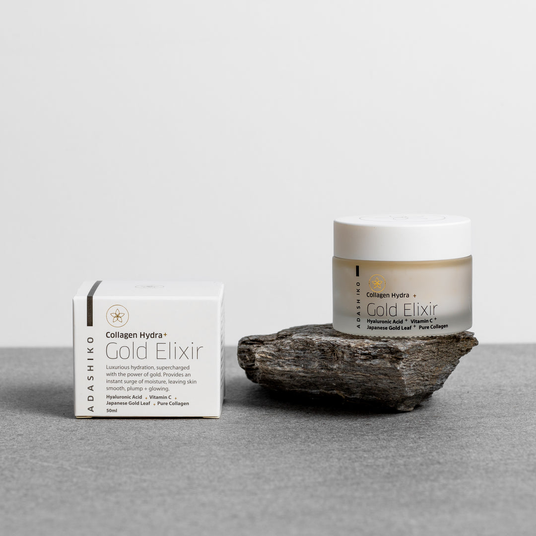 Collagen Hydra+ Gold Elixir - packaging + jar shown against a grey background | Adashiko Collagen | 100% Natural Skincare