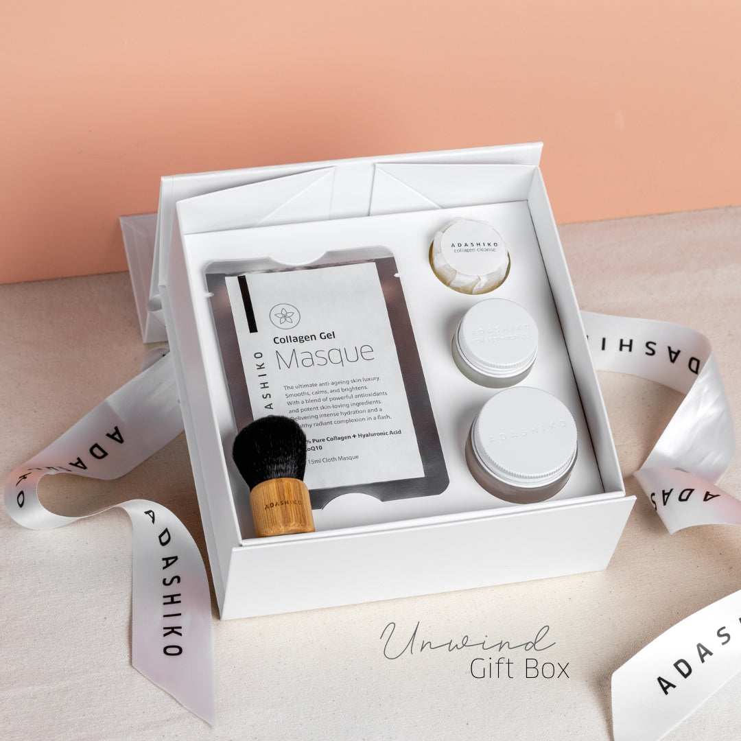 Unwind Gift Box shown open with products on display inside | Adashiko Collagen | 100% Natural Skincare